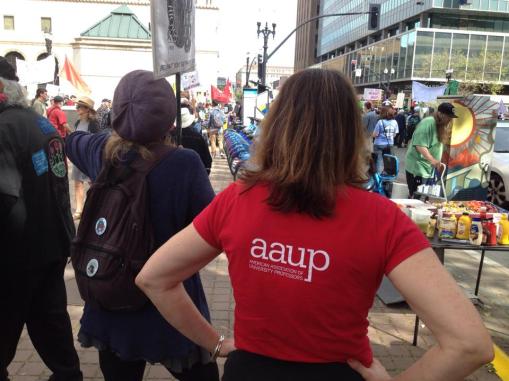 Balliger represents AAUP at International Workers Day in Oakland, May 1, 2018, in red union shirt